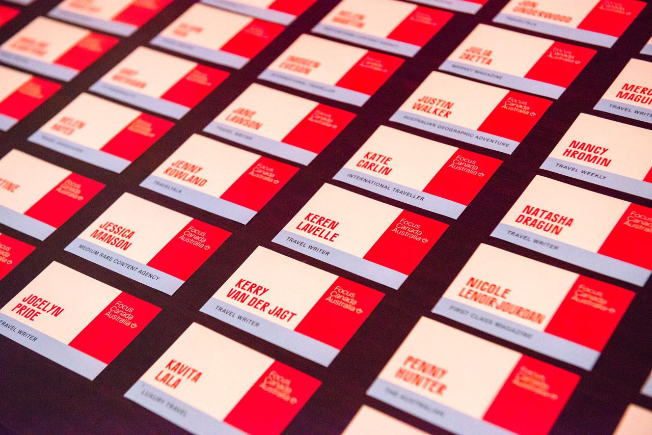 Rows of name badges on a table